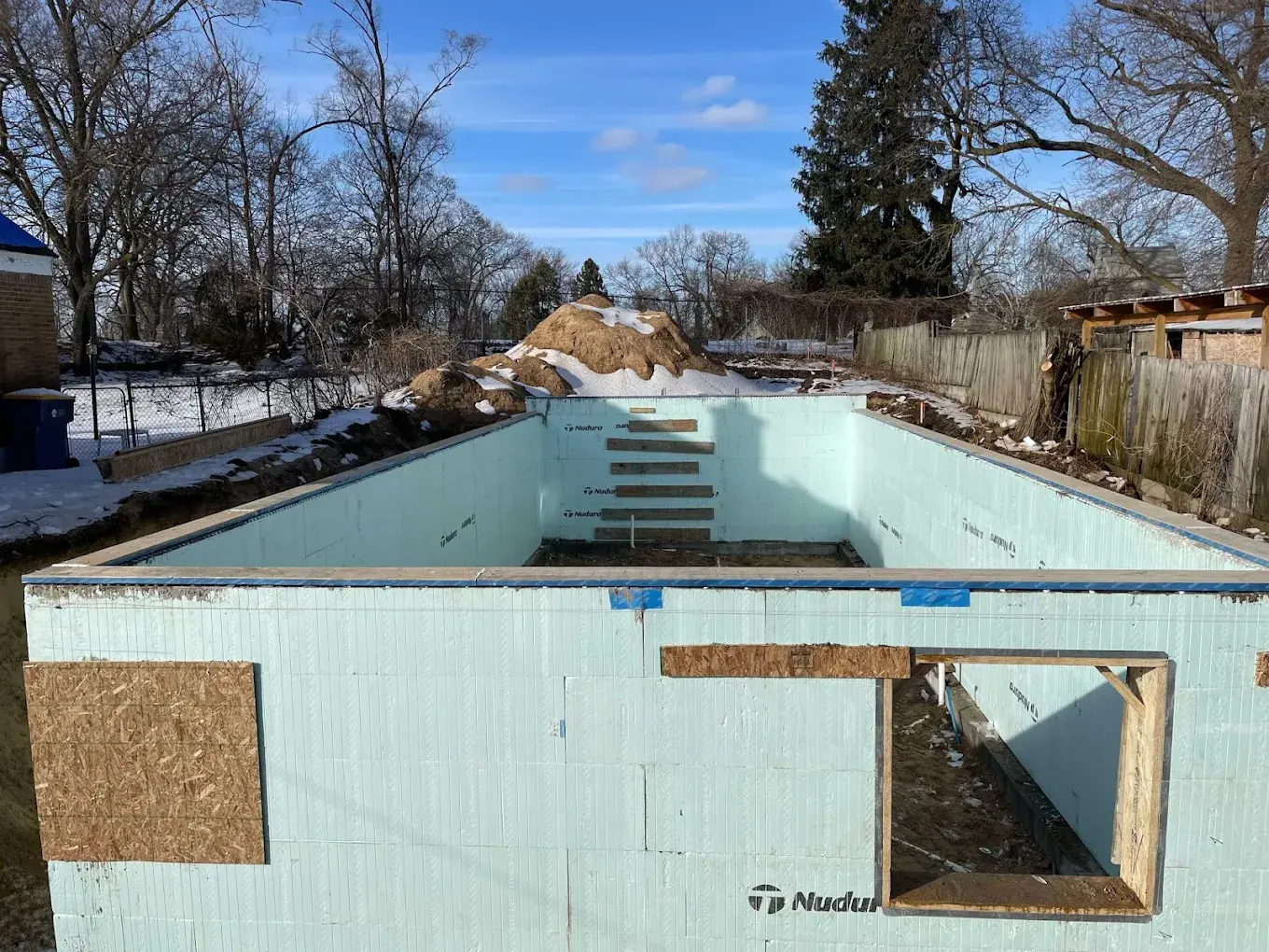 ICF insulated concrete form foundation for detached ADU with window cutouts and stepped footing in Snohomish County