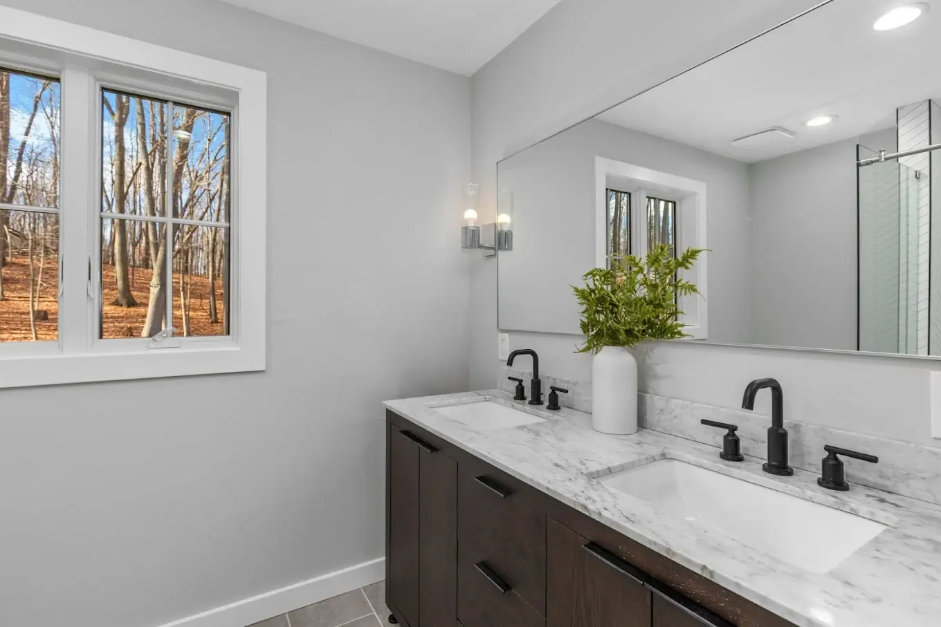 Bathroom shower remodel in progress showing Kerdi waterproofing membrane installation in Snohomish County